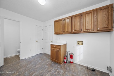 Situated on a quiet culdesac, this 3 bedroom, 2.5 bath home on Rock Creek Country Club in North Carolina - for sale on GolfHomes.com, golf home, golf lot