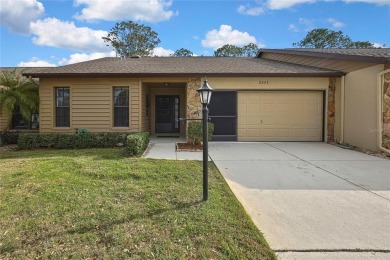 This charming villa, located on the first hole of the Grand on Timber Pines Golf Course in Florida - for sale on GolfHomes.com, golf home, golf lot