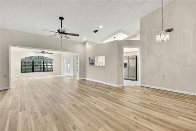 This charming villa, located on the first hole of the Grand on Timber Pines Golf Course in Florida - for sale on GolfHomes.com, golf home, golf lot