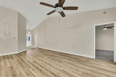 This charming villa, located on the first hole of the Grand on Timber Pines Golf Course in Florida - for sale on GolfHomes.com, golf home, golf lot