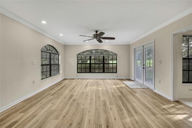 This charming villa, located on the first hole of the Grand on Timber Pines Golf Course in Florida - for sale on GolfHomes.com, golf home, golf lot