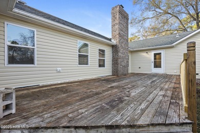 Situated on a quiet culdesac, this 3 bedroom, 2.5 bath home on Rock Creek Country Club in North Carolina - for sale on GolfHomes.com, golf home, golf lot