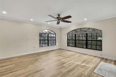 This charming villa, located on the first hole of the Grand on Timber Pines Golf Course in Florida - for sale on GolfHomes.com, golf home, golf lot