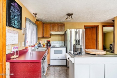 With some TLC, this home could shine again--but the best part? on The Hideout Golf in Pennsylvania - for sale on GolfHomes.com, golf home, golf lot