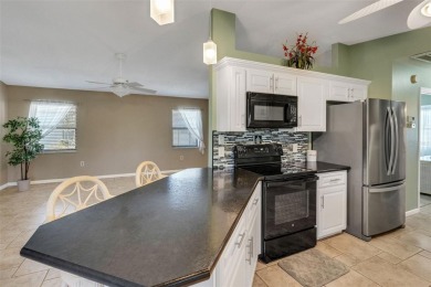 Located in the sought-after 55+ gated Highland Fairways Golf on Highland Fairways Golf Club in Florida - for sale on GolfHomes.com, golf home, golf lot