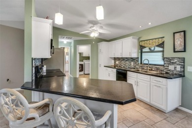 Located in the sought-after 55+ gated Highland Fairways Golf on Highland Fairways Golf Club in Florida - for sale on GolfHomes.com, golf home, golf lot