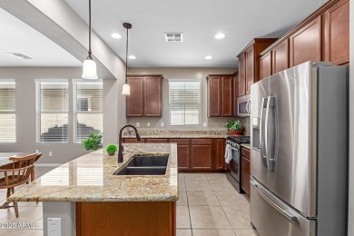 Nestled in the desirable Verrado community, this single-level on Verrado Golf Club  in Arizona - for sale on GolfHomes.com, golf home, golf lot