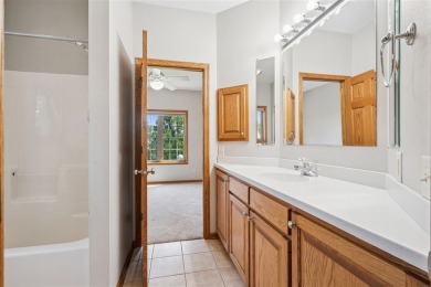 Welcome to a home where elegance meets everyday comfort on Brown Deer Golf Club in Iowa - for sale on GolfHomes.com, golf home, golf lot