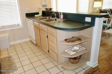 Beautifully furnished condo in Sea Trail Plantation with a golf on Sea Trail Golf Resort in North Carolina - for sale on GolfHomes.com, golf home, golf lot