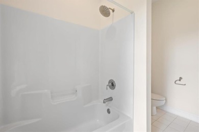 Welcome to this beautifully maintained 3-bedroom, 2-bathroom on Oak Grove Island Golf and Country Club in Georgia - for sale on GolfHomes.com, golf home, golf lot
