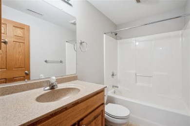 Welcome to a home where elegance meets everyday comfort on Brown Deer Golf Club in Iowa - for sale on GolfHomes.com, golf home, golf lot