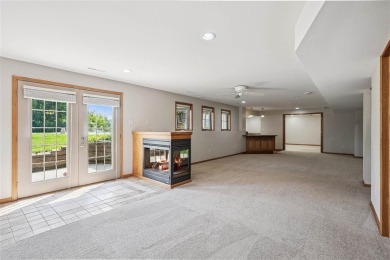 Welcome to a home where elegance meets everyday comfort on Brown Deer Golf Club in Iowa - for sale on GolfHomes.com, golf home, golf lot