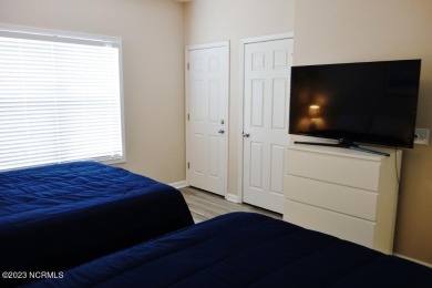 Beautifully furnished condo in Sea Trail Plantation with a golf on Sea Trail Golf Resort in North Carolina - for sale on GolfHomes.com, golf home, golf lot