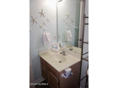 Beautifully furnished condo in Sea Trail Plantation with a golf on Sea Trail Golf Resort in North Carolina - for sale on GolfHomes.com, golf home, golf lot