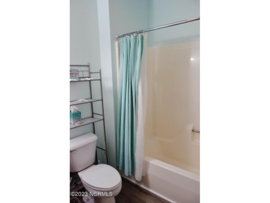 Beautifully furnished condo in Sea Trail Plantation with a golf on Sea Trail Golf Resort in North Carolina - for sale on GolfHomes.com, golf home, golf lot