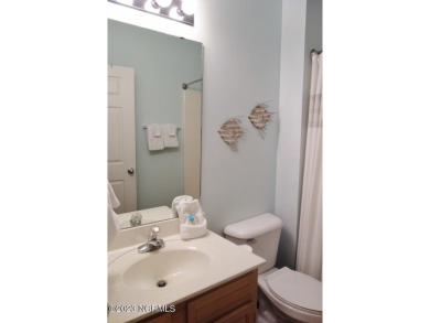 Beautifully furnished condo in Sea Trail Plantation with a golf on Sea Trail Golf Resort in North Carolina - for sale on GolfHomes.com, golf home, golf lot