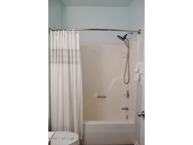 Beautifully furnished condo in Sea Trail Plantation with a golf on Sea Trail Golf Resort in North Carolina - for sale on GolfHomes.com, golf home, golf lot