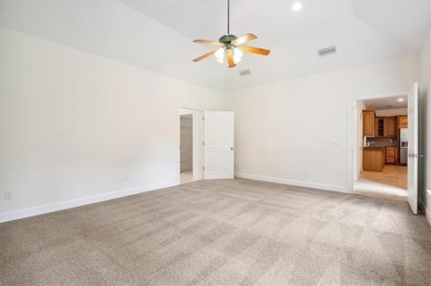 Welcome to this beautifully maintained 3-bedroom, 2-bathroom on Oak Grove Island Golf and Country Club in Georgia - for sale on GolfHomes.com, golf home, golf lot