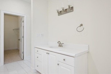 Welcome to this beautifully maintained 3-bedroom, 2-bathroom on Oak Grove Island Golf and Country Club in Georgia - for sale on GolfHomes.com, golf home, golf lot