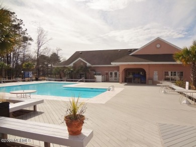Beautifully furnished condo in Sea Trail Plantation with a golf on Sea Trail Golf Resort in North Carolina - for sale on GolfHomes.com, golf home, golf lot