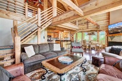 This log home comes fully furnished and is a true mountain on Raven Golf Club At Three Peaks in Colorado - for sale on GolfHomes.com, golf home, golf lot