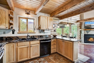 This log home comes fully furnished and is a true mountain on Raven Golf Club At Three Peaks in Colorado - for sale on GolfHomes.com, golf home, golf lot