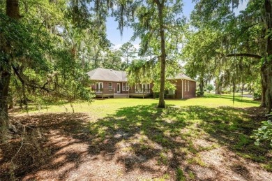 Welcome to this beautifully maintained 3-bedroom, 2-bathroom on Oak Grove Island Golf and Country Club in Georgia - for sale on GolfHomes.com, golf home, golf lot
