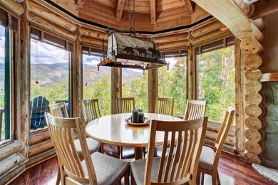 This log home comes fully furnished and is a true mountain on Raven Golf Club At Three Peaks in Colorado - for sale on GolfHomes.com, golf home, golf lot