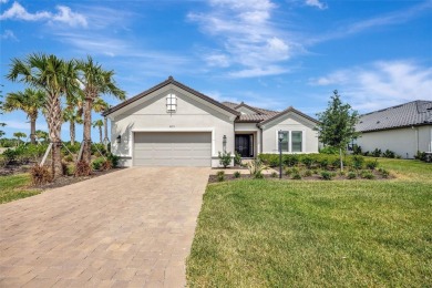 Welcome to your future dream home! This exquisitely upgraded on Esplanade Golf and Country at Lakewood Ranch in Florida - for sale on GolfHomes.com, golf home, golf lot