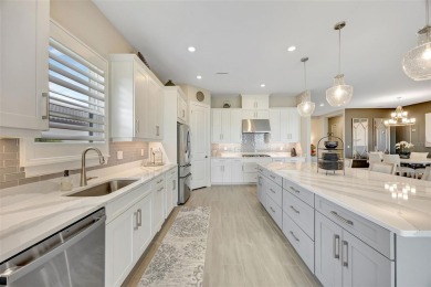 Welcome to your future dream home! This exquisitely upgraded on Esplanade Golf and Country at Lakewood Ranch in Florida - for sale on GolfHomes.com, golf home, golf lot
