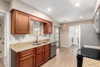 Spacious and beautifully updated, this Gemini model sits on a on Sun City Country Club in Arizona - for sale on GolfHomes.com, golf home, golf lot