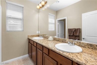 This single-level 3-bedroom, 2.5-bathroom home with a den, built on Wolf Creek At Paradise Canyon in Nevada - for sale on GolfHomes.com, golf home, golf lot
