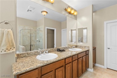 This single-level 3-bedroom, 2.5-bathroom home with a den, built on Wolf Creek At Paradise Canyon in Nevada - for sale on GolfHomes.com, golf home, golf lot