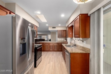 Spacious and beautifully updated, this Gemini model sits on a on Sun City Country Club in Arizona - for sale on GolfHomes.com, golf home, golf lot