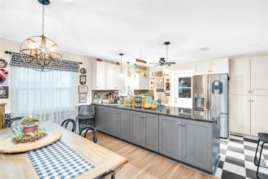 Updates Galore in this gorgeous two bedroom two full bath Villa! on Highland Lakes Executive Golf Course in Florida - for sale on GolfHomes.com, golf home, golf lot