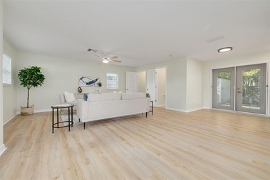 Welcome to this beautifully updated 2-bedroom, 1.5-bathroom on The Dunedin Country Club in Florida - for sale on GolfHomes.com, golf home, golf lot