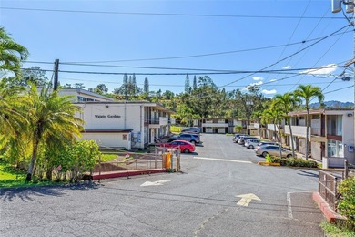 Are you looking for a cozy 2-bedroom/1-bathroom/1-parking condo on Mililani Golf Club in Hawaii - for sale on GolfHomes.com, golf home, golf lot