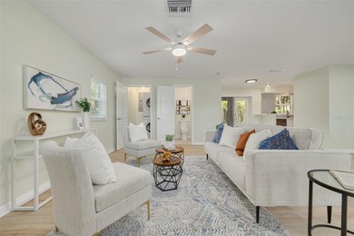 Welcome to this beautifully updated 2-bedroom, 1.5-bathroom on The Dunedin Country Club in Florida - for sale on GolfHomes.com, golf home, golf lot