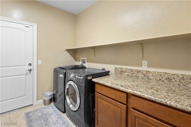 This single-level 3-bedroom, 2.5-bathroom home with a den, built on Wolf Creek At Paradise Canyon in Nevada - for sale on GolfHomes.com, golf home, golf lot
