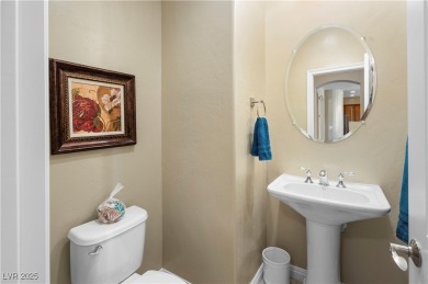This single-level 3-bedroom, 2.5-bathroom home with a den, built on Wolf Creek At Paradise Canyon in Nevada - for sale on GolfHomes.com, golf home, golf lot