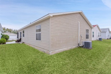 Welcome to Hialeah Villas in the Village of Belvedere. This home on Churchill Greens Executive Golf Course in Florida - for sale on GolfHomes.com, golf home, golf lot