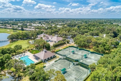 How soon can you move? Look no further! This low-maintenance on Rosedale Golf and Tennis Club in Florida - for sale on GolfHomes.com, golf home, golf lot