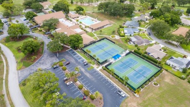 Updates Galore in this gorgeous two bedroom two full bath Villa! on Highland Lakes Executive Golf Course in Florida - for sale on GolfHomes.com, golf home, golf lot