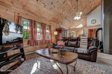 This gorgeous log home truly embraces the ''life in the on The Hideout Golf in Pennsylvania - for sale on GolfHomes.com, golf home, golf lot
