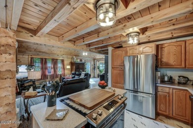 This gorgeous log home truly embraces the ''life in the on The Hideout Golf in Pennsylvania - for sale on GolfHomes.com, golf home, golf lot