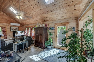 This gorgeous log home truly embraces the ''life in the on The Hideout Golf in Pennsylvania - for sale on GolfHomes.com, golf home, golf lot