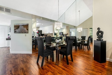 Beautiful views and an exceptional location define this elegant on Gleneagles Golf and Country Club in Florida - for sale on GolfHomes.com, golf home, golf lot