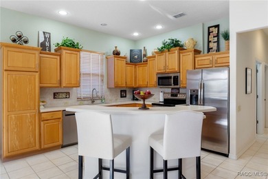 A little bit of heaven awaits you in this maintenance free on Southern Woods Golf Club in Florida - for sale on GolfHomes.com, golf home, golf lot