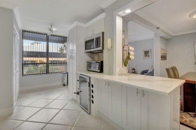 This stunning first-floor condo offers a spacious and modern on Boca Pointe Country Club in Florida - for sale on GolfHomes.com, golf home, golf lot