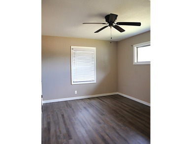 Updated 3 bedroom, 1 bathroom home only blocks from a golf on Sweetwater Country Club in Texas - for sale on GolfHomes.com, golf home, golf lot